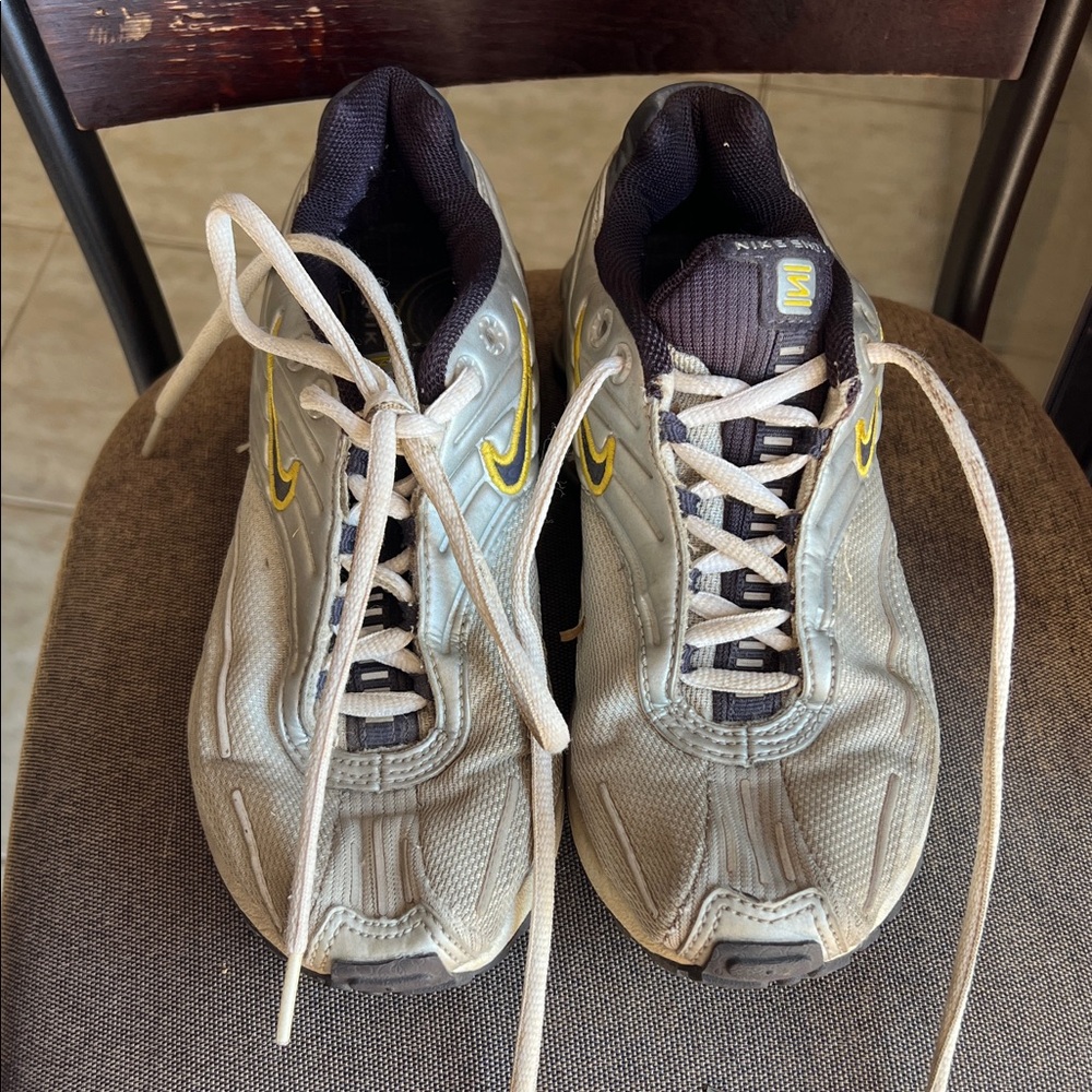 Vintage Nike Gray Athletic Sneakers with Yellow Swoosh